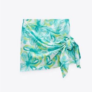 Linen blend tropical print mini pareo skirt